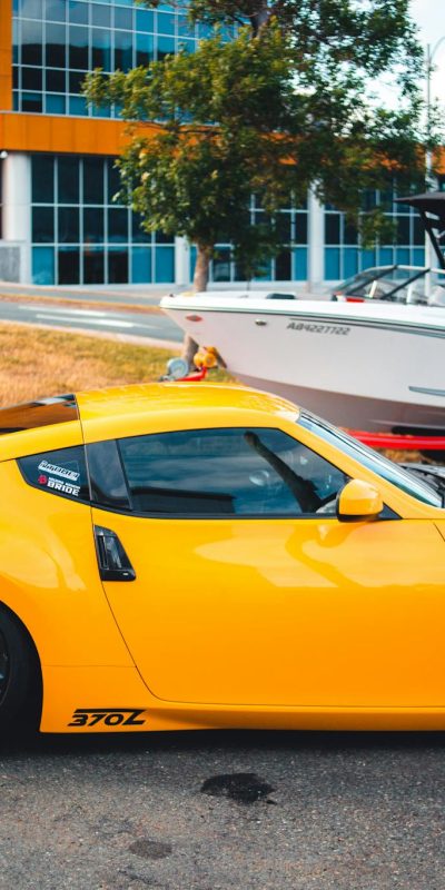 Modern Yellow Sport Car on City Street
